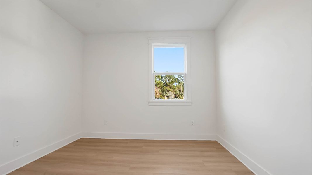 Representative unfurnished interior of a home built from the Trenton by D.R. Horton in Parkside, Santa Rosa Beach (Image 19).