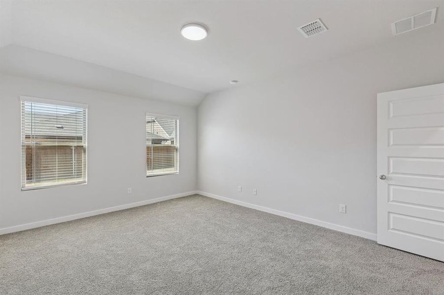 Primary Suite in the Harrison home plan by Trophy Signature Homes – REPRESENTATIVE PHOTO
