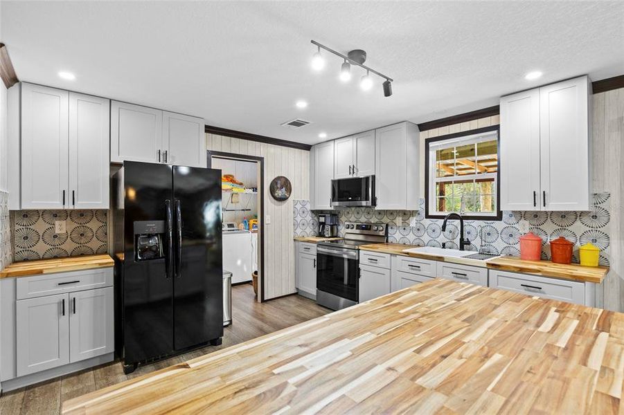 Furnished interior view inside a new home in , Okeechobee (Image 12).