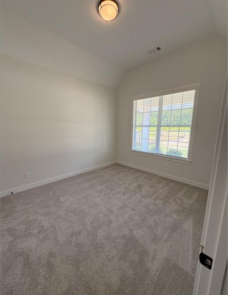 Neutral tone-on-tone carpeting complements white walls and trim Neutral tone-on-tone carpeting complements white walls and trim