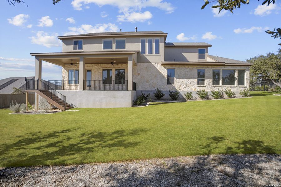 Exterior details and patio area of a home in Highland Estates, San Antonio (Image 23).