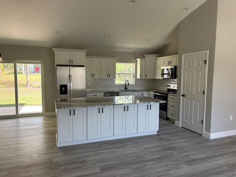Furnished interior view inside a new home in , Dunnellon (Image 9).