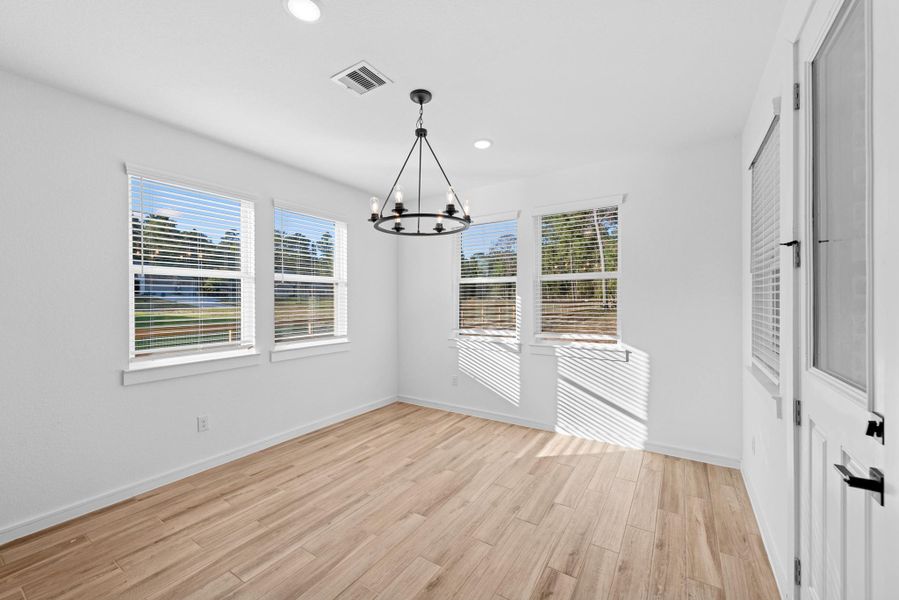 Sun-lit dining area (*Photo not of actual home and used for illustration purposes only.)