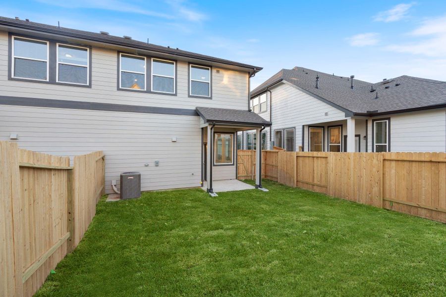 Exterior details and patio area of a home in Woodforest, Montgomery (Image 21). Exterior details and patio area of a home in Woodforest, Montgomery (Image 21).
