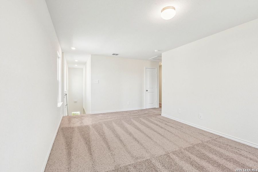 Spacious, unfurnished interior of a new home in Woodside Farms, Seguin (Image 44).
