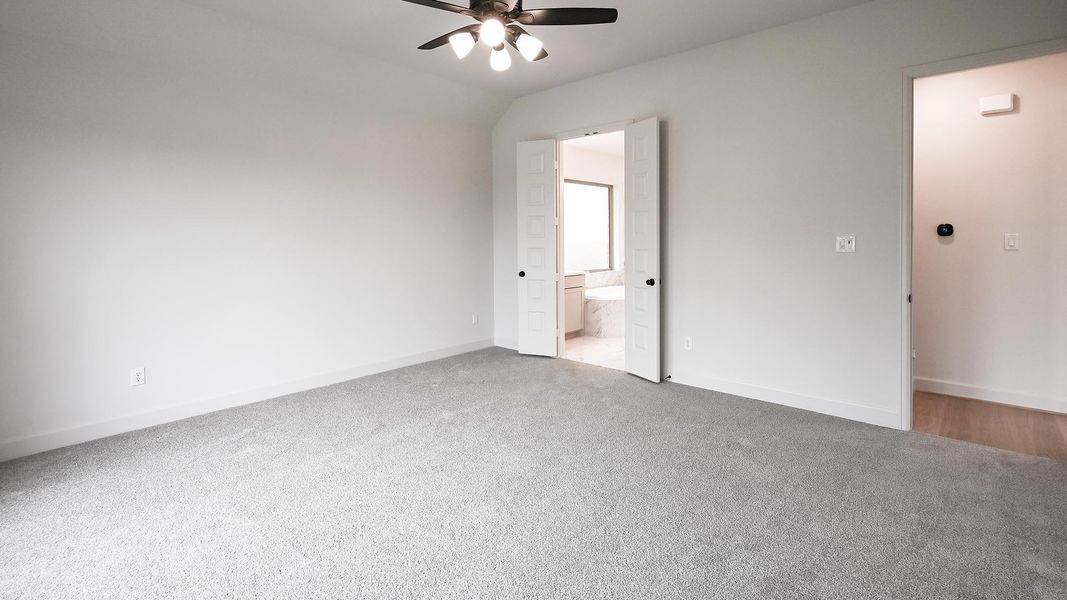 Spacious, unfurnished interior of a new home in 6 Creeks, Kyle (Image 24).