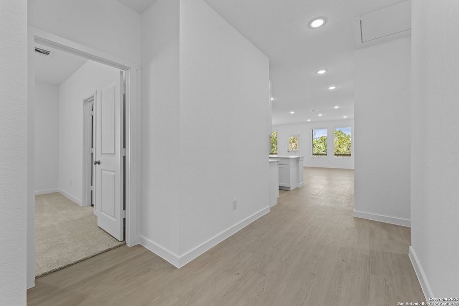 Spacious, unfurnished interior of a new home in Waterwheel: Coastline Collection, San Antonio (Image 22).