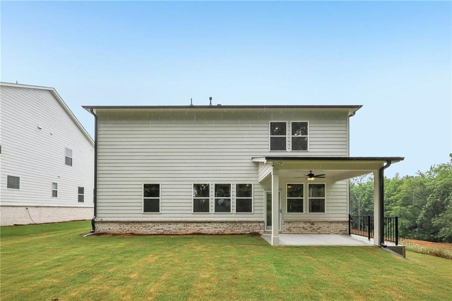 Exterior details and patio area of a home in Bailey Fence, Dacula (Image 21).