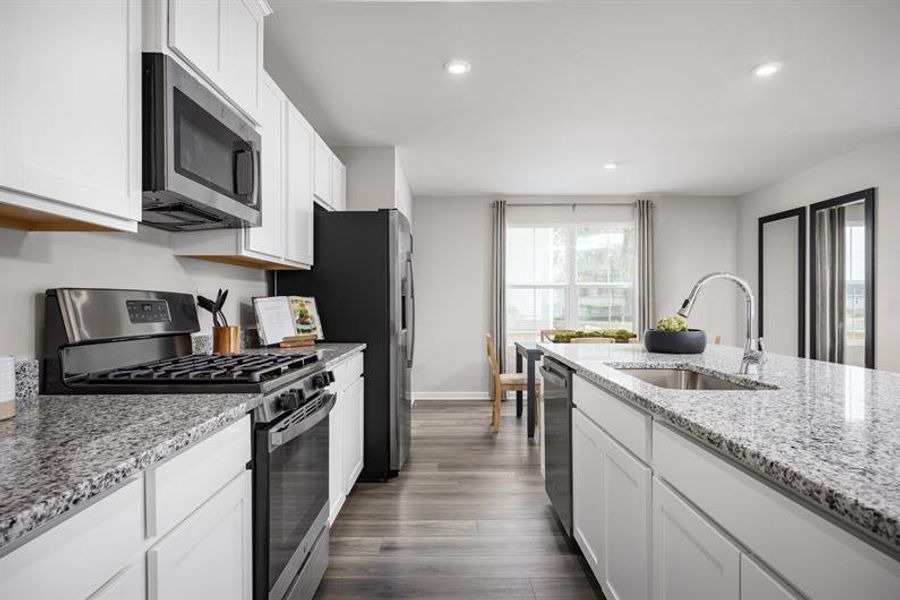Representative furnished interior of a home built from the Marigold by Ryan Homes in Harpers Glen Single Family, Wendell (Image 6).