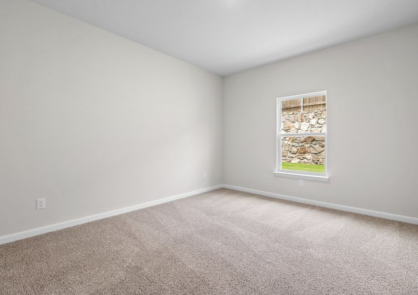 The master bedroom is spacious and has a wonderful window. The master bedroom is spacious and has a wonderful window.