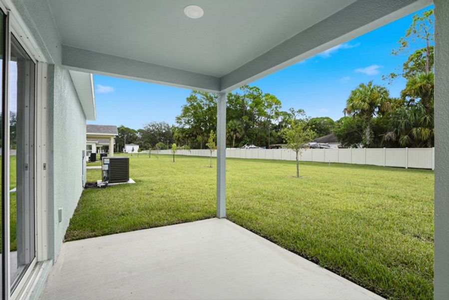 Exterior details and patio area of a home in Richmond Cove, Palm Bay (Image 4). Exterior details and patio area of a home in Richmond Cove, Palm Bay (Image 4).