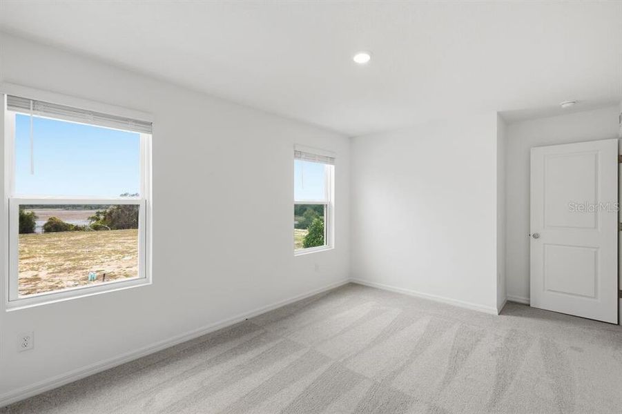 Spacious, unfurnished interior of a new home in Waterstone, Groveland (Image 22).