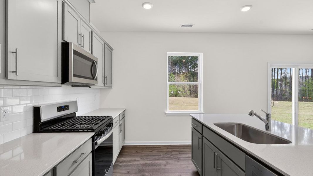 Furnished interior view inside a new home in The Landing at Winston Pointe, Clayton (Image 7).