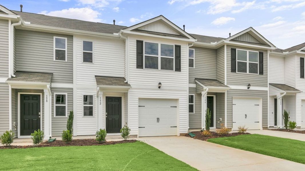 Front exterior of a new home in The Townes at Wilson's Ridge, Smithfield, NC, highlighting curb appeal (Image 2).