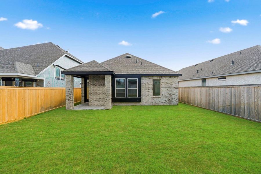 Exterior details and patio area of a home in Bridgeland, Cypress (Image 3). Exterior details and patio area of a home in Bridgeland, Cypress (Image 3).