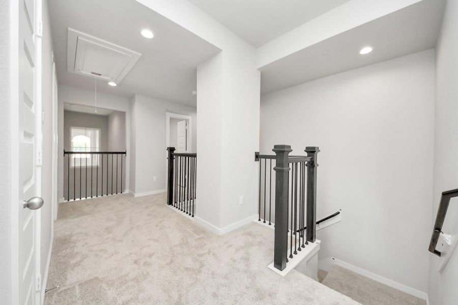 Come upstairs and enjoy a day of leisure in this fabulous game room! This is the perfect hangout spot or adult game room! Features plush carpet, high ceilings, custom paint and windows for plenty of natural light. Come upstairs and enjoy a day of leisure in this fabulous game room! This is the perfect hangout spot or adult game room! Features plush carpet, high ceilings, custom paint and windows for plenty of natural light.