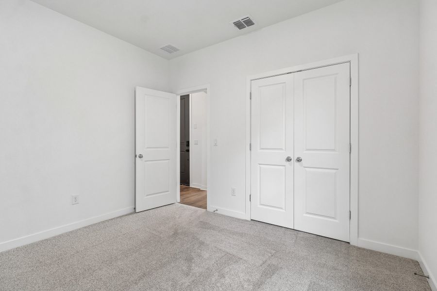 Spacious, unfurnished interior of a new home in Parkton Square, Kyle (Image 22).