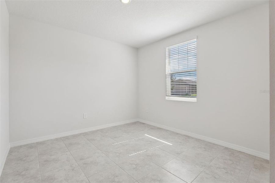 Spacious, unfurnished interior of a new home in Lawson Dunes - Signature Series, Haines City (Image 21).