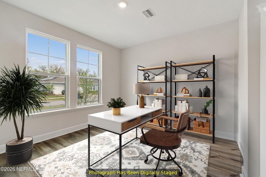 Furnished interior view inside a new home in Tributary 50', Yulee (Image 8).