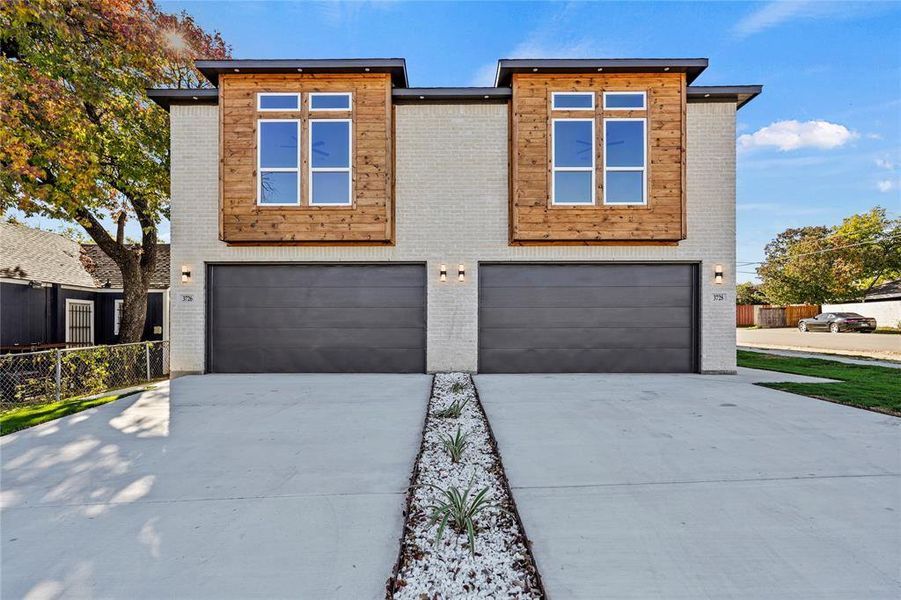 Contemporary house featuring a garage