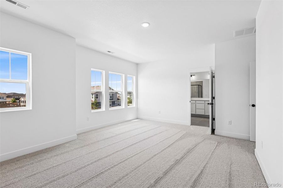Spacious, unfurnished interior of a new home in Painted Prairie Cottage, Aurora (Image 29).