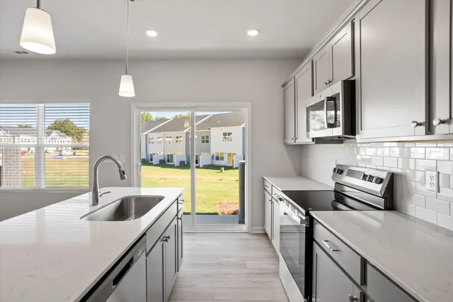 Furnished interior view inside a new home in West Main Townhomes, Sanford (Image 10).