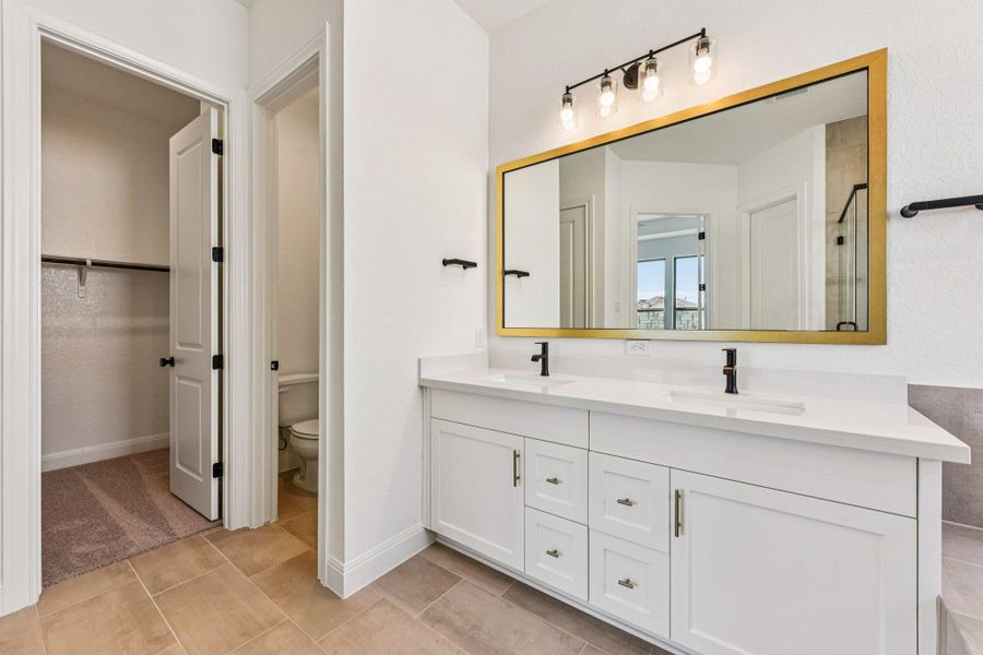 Furnished interior view inside a new home in 6 Creeks, Kyle (Image 11).