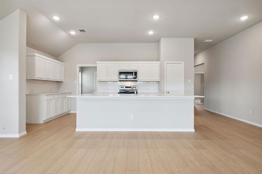 Kitchen in the Diamond home plan by Trophy Signature Homes – REPRESENTATIVE PHOTO Kitchen in the Diamond home plan by Trophy Signature Homes – REPRESENTATIVE PHOTO