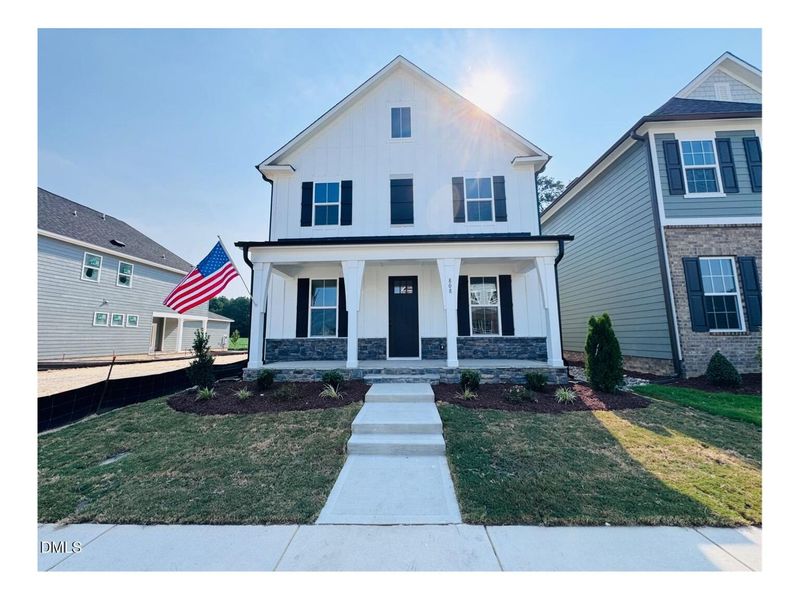 Front exterior of a new home in Forestville Yard, Knightdale, NC, highlighting curb appeal (Image 1). Front exterior of a new home in Forestville Yard, Knightdale, NC, highlighting curb appeal (Image 1).