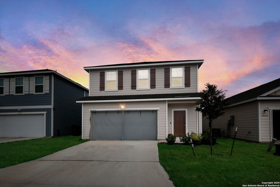 Front exterior of a new home in Trails at Culebra, San Antonio, TX, highlighting curb appeal (Image 2). Front exterior of a new home in Trails at Culebra, San Antonio, TX, highlighting curb appeal (Image 2).