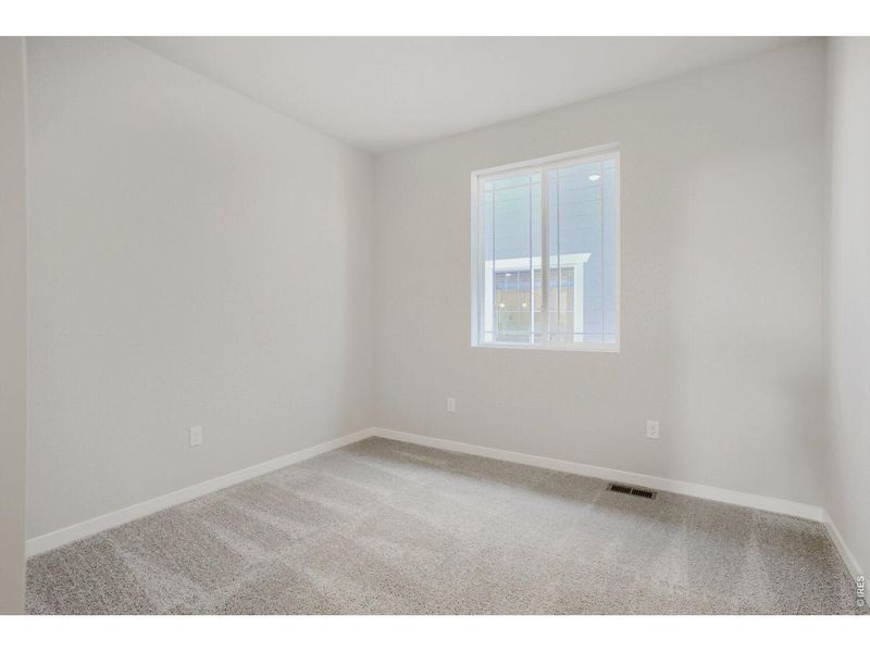 Spacious, unfurnished interior of a new home in Farmstead, Berthoud (Image 20).