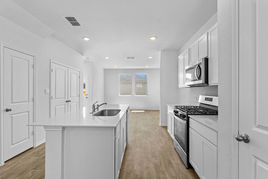Furnished interior view inside a new home in Valverde, Bastrop (Image 10).