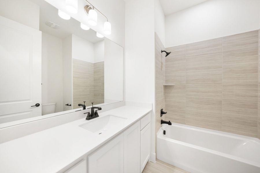 Furnished interior view inside a new home in Winding Creek, Rockwall (Image 15).