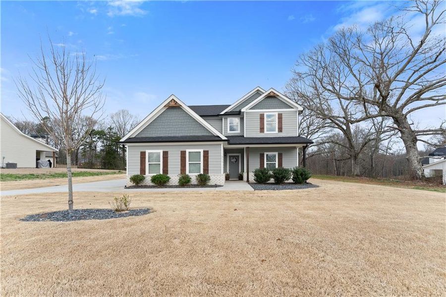 Front exterior of a new home in , Jefferson, GA, highlighting curb appeal (Image 21).