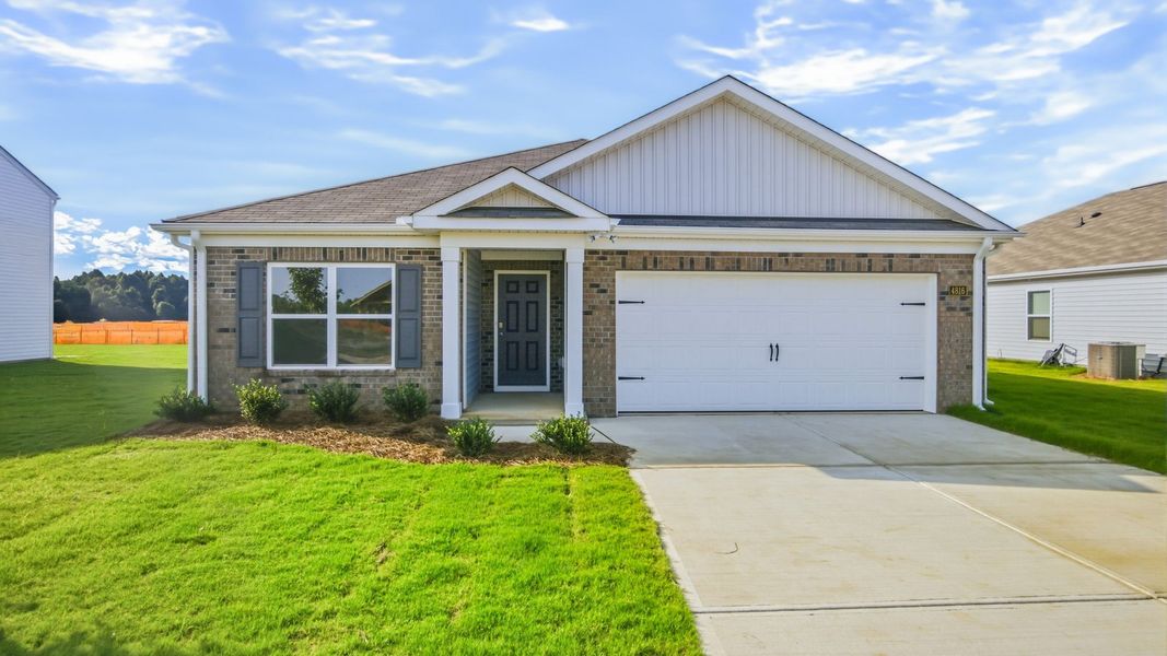 Front exterior of a new home in Bynum Farms, Farmville, NC, highlighting curb appeal (Image 1). Front exterior of a new home in Bynum Farms, Farmville, NC, highlighting curb appeal (Image 1).