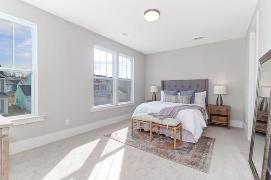 Representative furnished interior of a home built from the Inverness P by True Homes in Homecoming, Ravenel (Image 14).