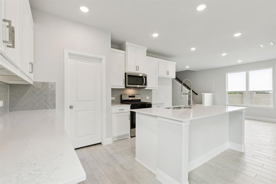 Furnished interior view inside a new home in AnaCapri, Anna (Image 9).