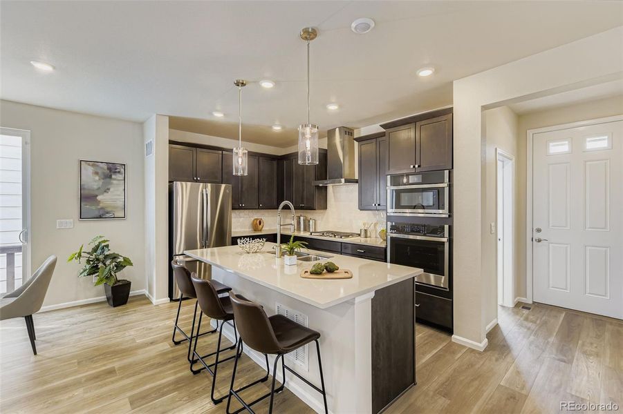 Furnished interior view inside a new home in The Villas Collection at Sterling Ranch, Littleton (Image 6).
