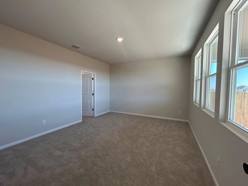 Spacious, unfurnished interior of a new home in Willow Springs, Buda (Image 20).