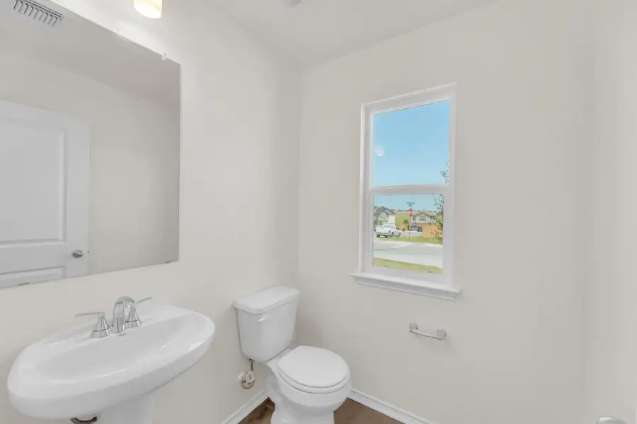 Furnished interior view inside a new home in Sonterra - Cool Water, Jarrell (Image 6).