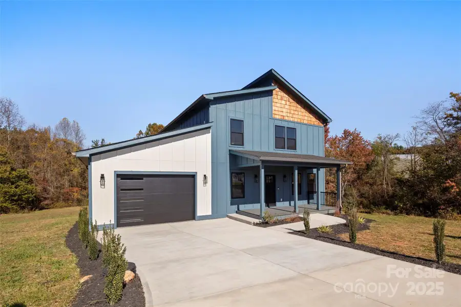 Front exterior of a new home in , Asheville, NC, highlighting curb appeal (Image 1).