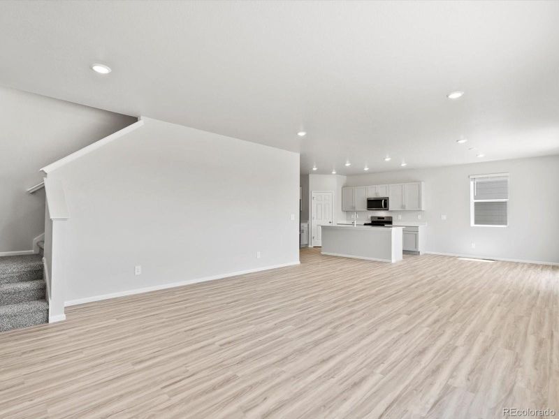 Spacious, unfurnished interior of a new home in Ridgeline Vista: The Canyon Collection, Brighton (Image 26).