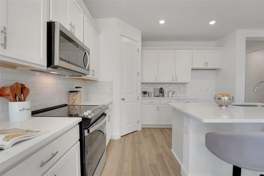 Furnished interior view inside a new home in Green Key Village, Lady Lake (Image 15).