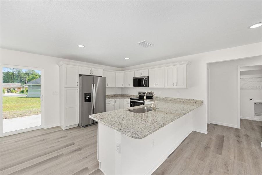 Furnished interior view inside a new home in , Dunnellon (Image 19).