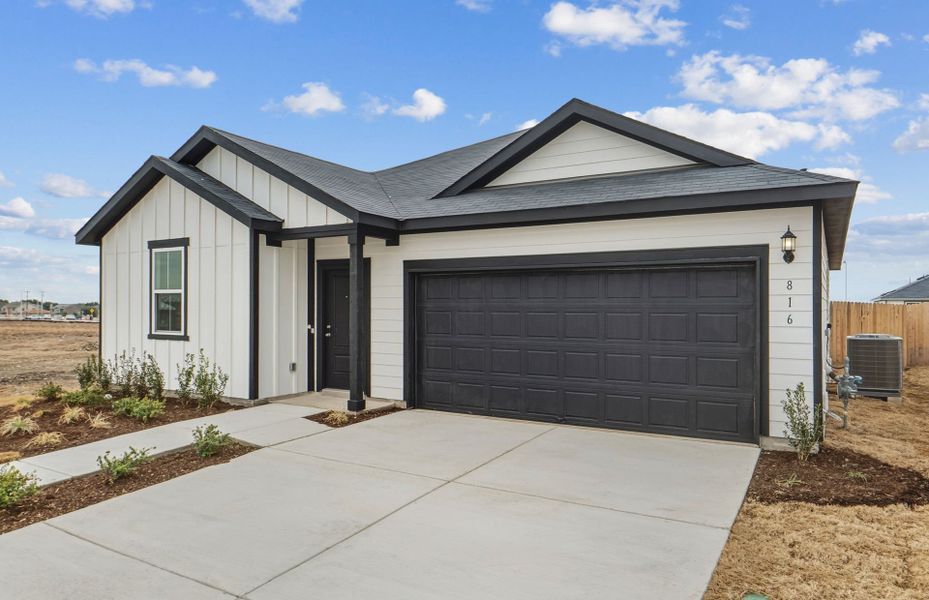 Front exterior of a new home in Alto, San Marcos, TX, highlighting curb appeal (Image 17).