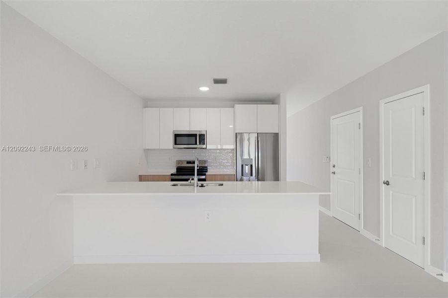 Furnished interior view inside a new home in , Miami (Image 7). Furnished interior view inside a new home in , Miami (Image 7).