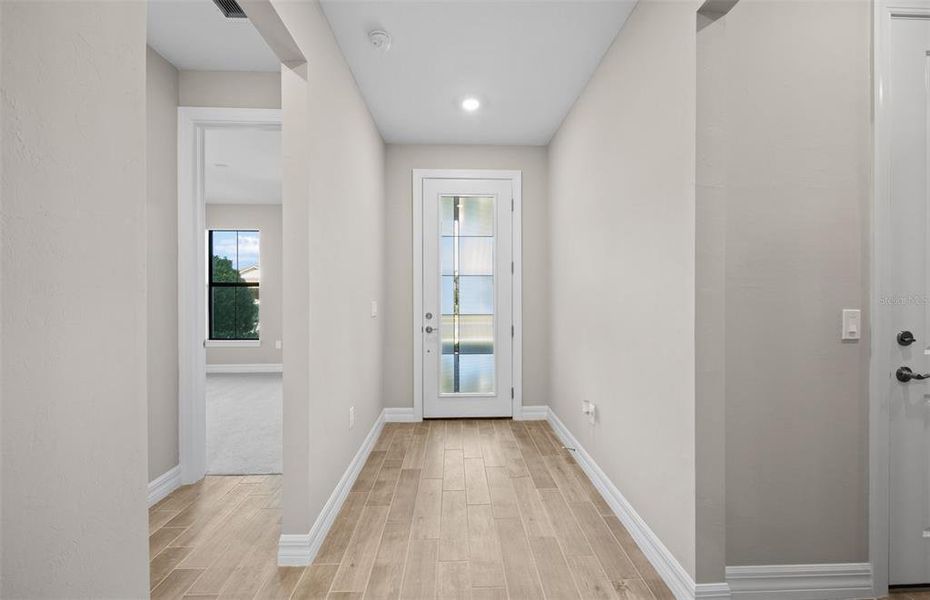 Spacious, unfurnished interior of a new home in Cedar Grove at The Woodlands, North Port (Image 24).