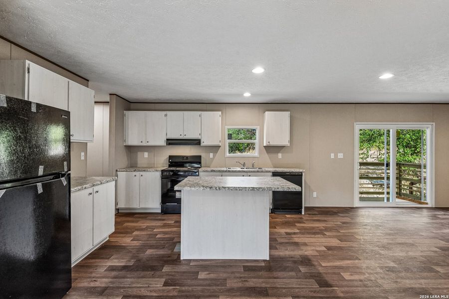 Furnished interior view inside a new home in , Hondo (Image 8).