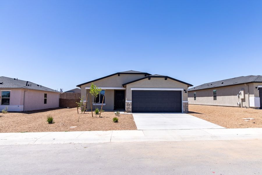 Front exterior of a new home in Perkinsville, Chino Valley, AZ, highlighting curb appeal (Image 18). Front exterior of a new home in Perkinsville, Chino Valley, AZ, highlighting curb appeal (Image 18).
