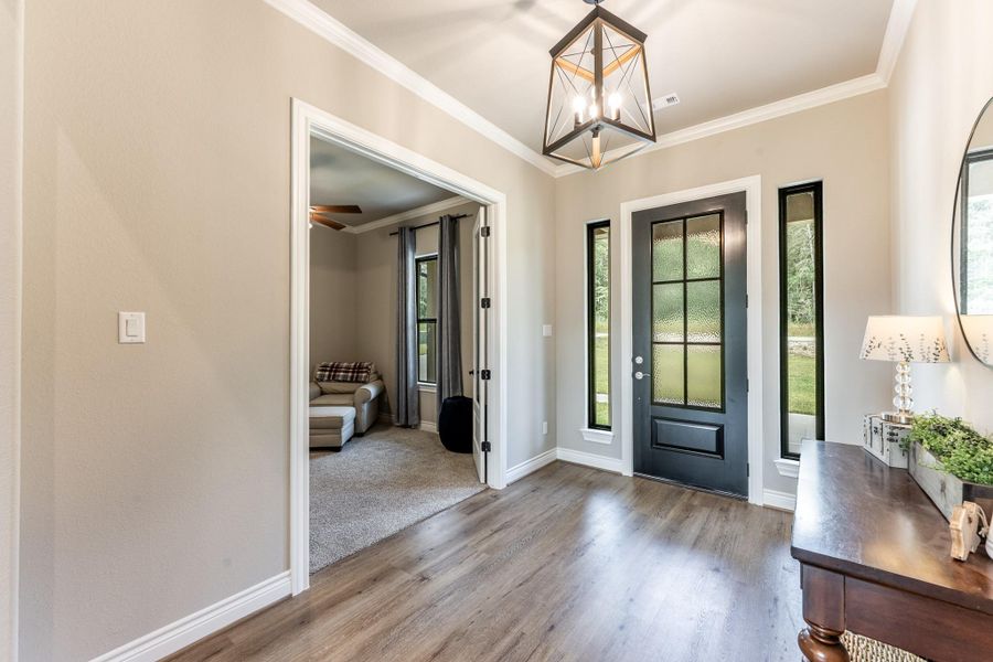 Farmhouse accents with black door and black framed windows